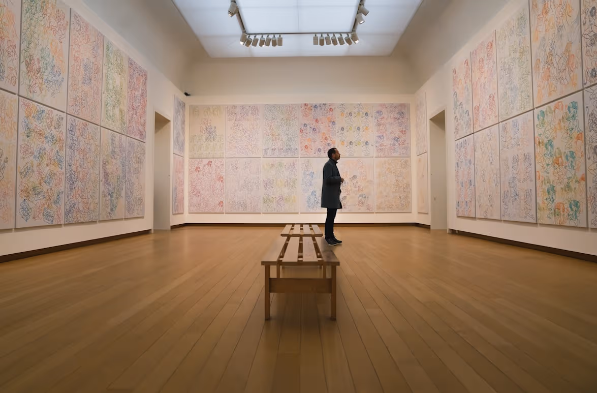 Patron looking at art in a modern gallery
